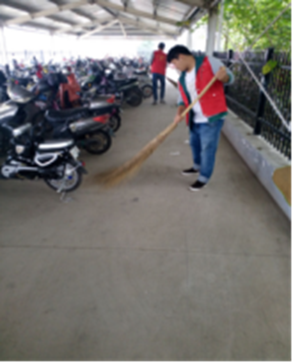传媒工程系志愿者活动之清扫车棚207.png